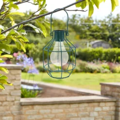 House Beautiful Firefly Solar Powered Caged Lantern -Luxe Light Shop 13280804 1194933437034953